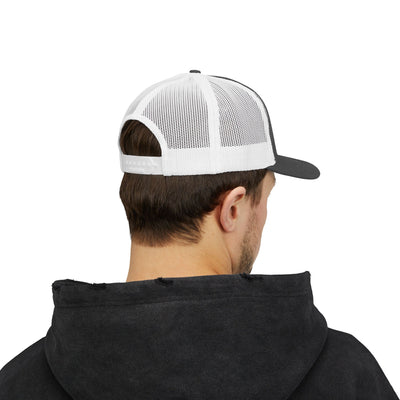 Back view of a man wearing a Trucker Snapback Cap with a white mesh panel and a black brim.