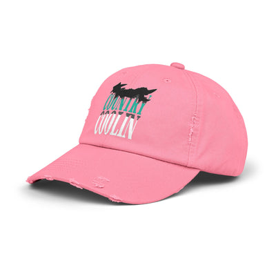 Unisex distressed pink cap with stylish graphic text, perfect for casual outings and adjustable fit.